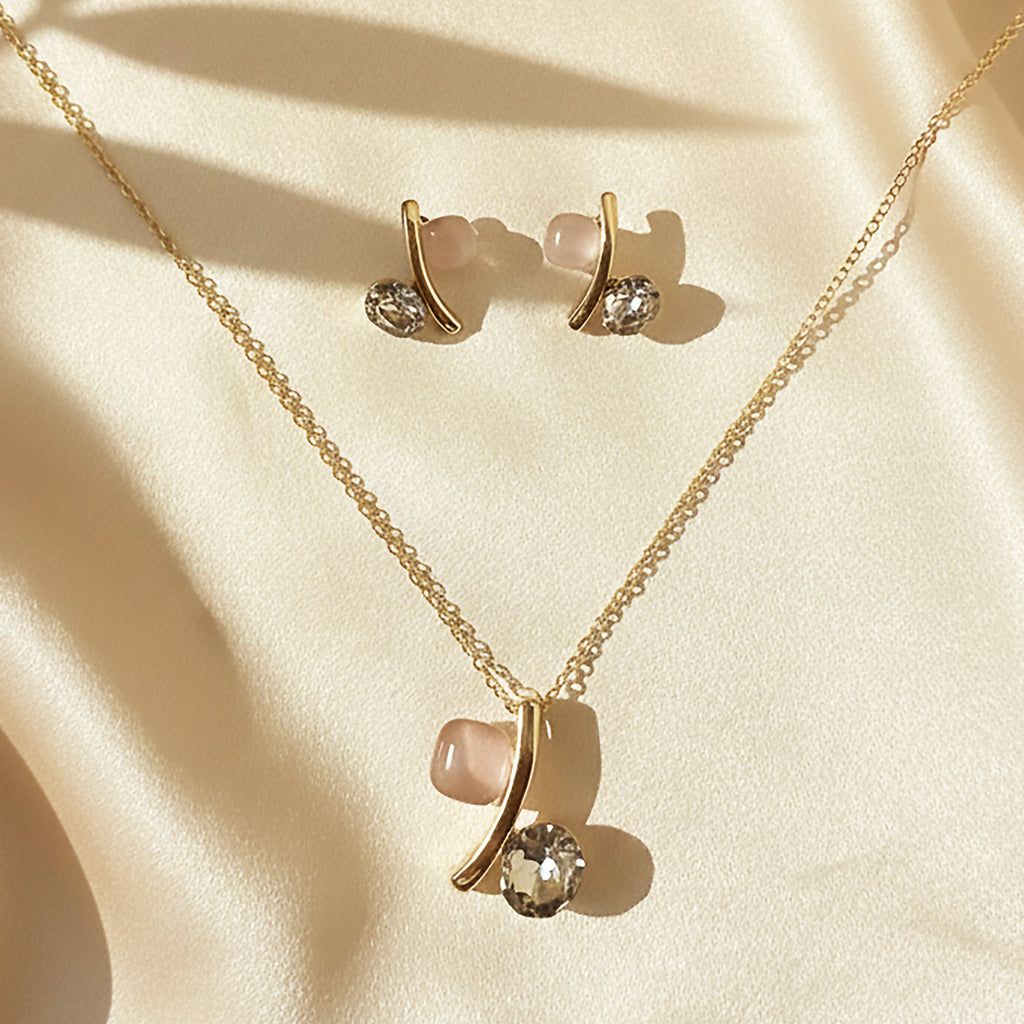 Soft Tension – Parure Dorée aux Pierres Contrastées